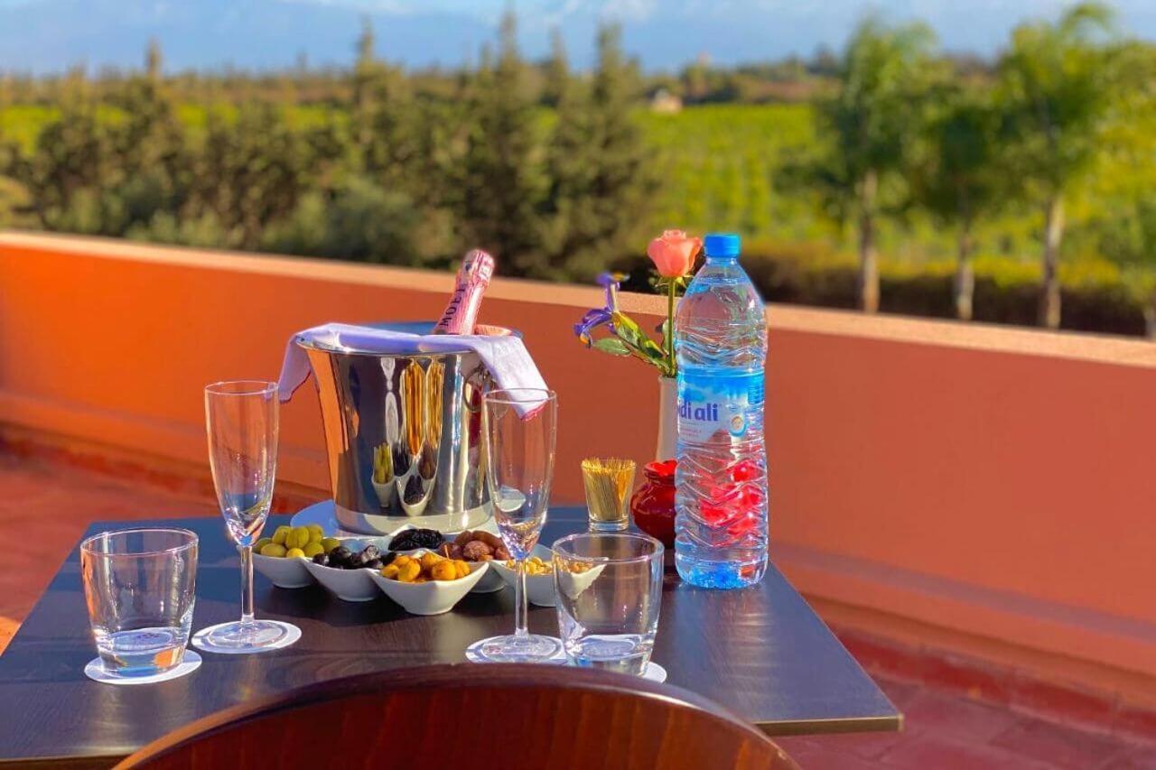 El Olivar Palace Marrakech El Harkat المظهر الخارجي الصورة A bottle of water
