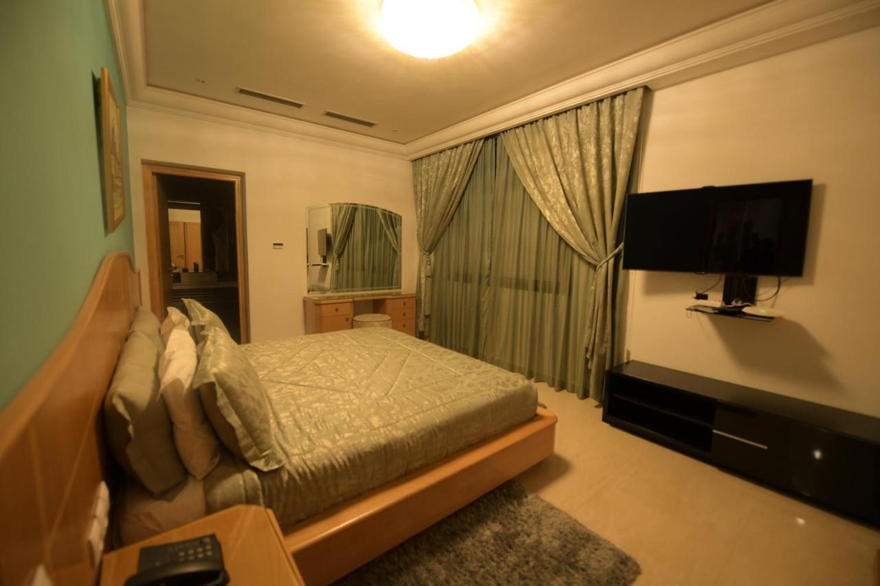 El Olivar Palace Marrakech El Harkat المظهر الخارجي الصورة A bedroom in a condominium