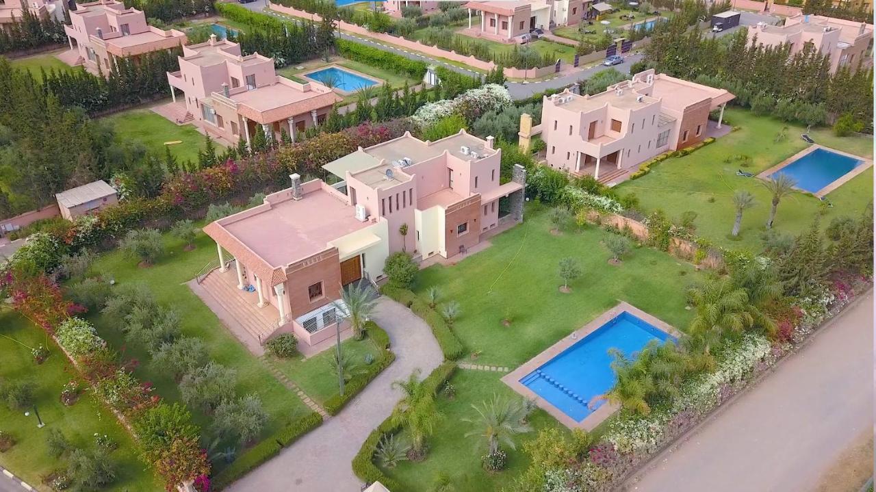 El Olivar Palace Marrakech El Harkat المظهر الخارجي الصورة Residential villas in the village